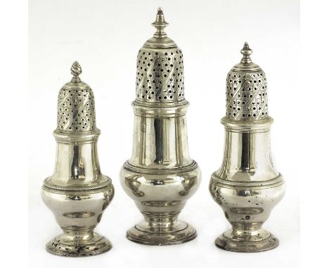 A George III silver sugar caster,by John Delmester, London 1763,of baluster form, the engraved pierced cover above a plain bo
