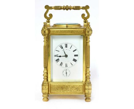 A French brass carriage clock,late 19th century, the white enamel dial inscribed 'A I The Equator French Made', with alarm di