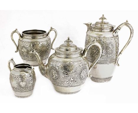 A Scottish silver four-piece tea set,by J R, Glasgow 1879-1880, consisting of:a teapot,hot water jug,sugar basin, andcream ju