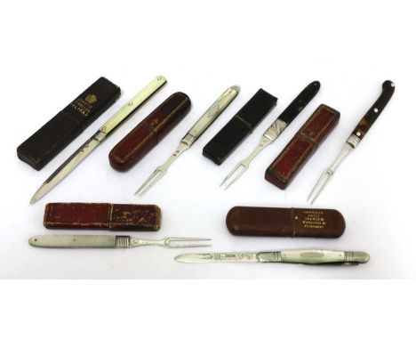 Six silver-mounted folding fruit knives and forks in cases,the first, a knife with lion passant and incuse duty mark for 1784