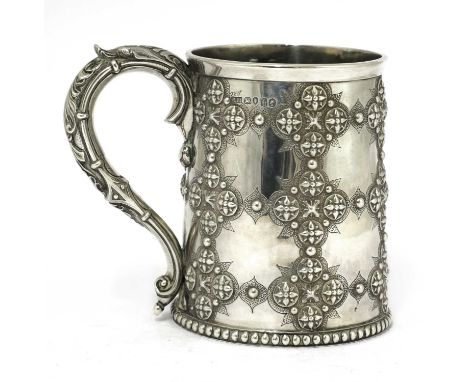 A Victorian silver mug, by Robert Hennell III, London 1865,of tapering form, embossed with quatrefoil latticework, initialled