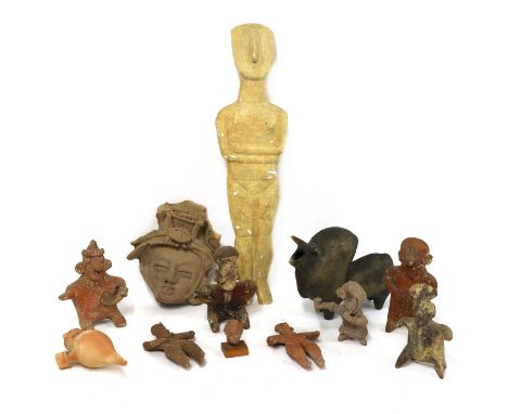 Various pre-Columbian and other terracotta wares,comprising:a mask, 19cm high, seven figures, largest 16.5cm high, an Amlash-