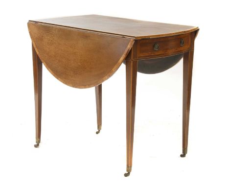 A Sheraton period mahogany oval Pembroke table, c.1800, crossbanded in rosewood with ebony line inlaid decoration, on taperin