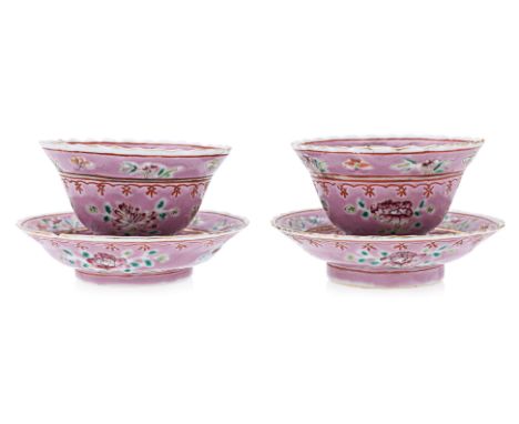 A PAIR OF PINK GROUND 'BUTTERFLY' TEA BOWLS AND SAUCERS
Gilt-edged wavy rim, straight footring, the interior decorated with f