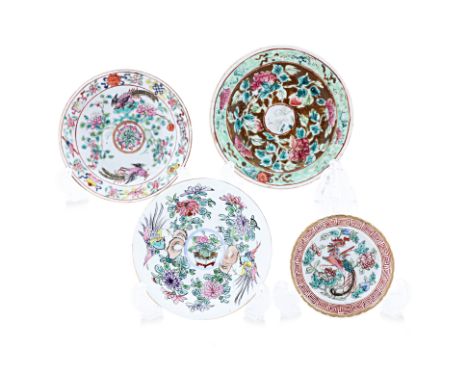 A GROUP OF FAMILLE ROSE SAUCERS
One saucer decorated with peonies on olive green ground and crane within medallion, two with 