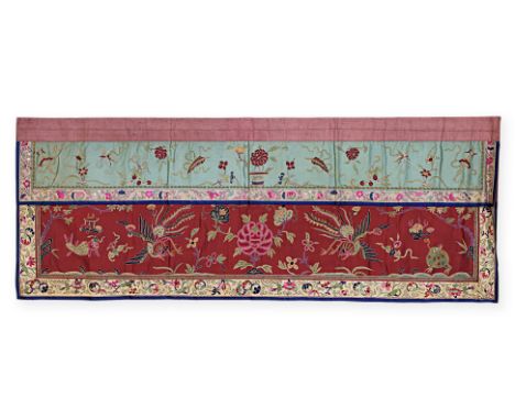 AN EMBROIDERED SILK PANEL
Rectangular panel with red and green silk background, lower decorated in two flying phoenix, centra