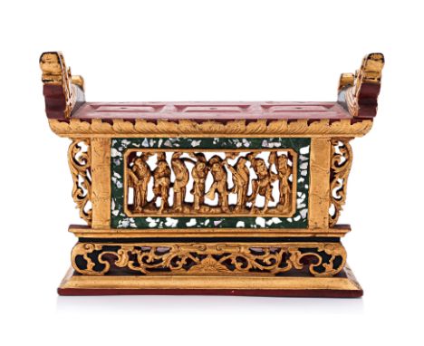 A CARVED AND GILT ALTAR STAND
Gilt timber, rectangular front panel with eight figures, inset abalone shell to green border, f