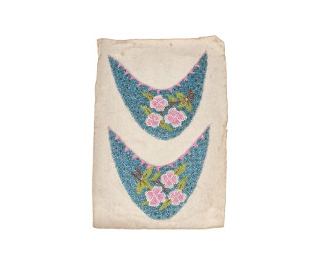 A PAIR OF BEADED SLIPPER PANELS
Embroidered with tubular beads with pink and white flowers on a blue ground
The panel 30cm lo