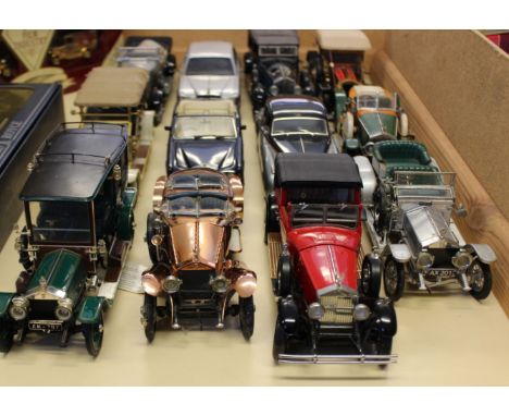 Twelve Franklin Mint Rolls-Royce 1/24 precision models, to include Silver Ghost, Phantom, Silver Cloud, Silver Seraph and Cor