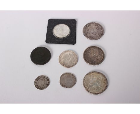 A small collection of coins to include A King Charles I Shilling, around fine, some flange damage, a George III Shilling, a G