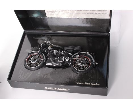 A boxed Minichamps Vincent Black Shadow 1:12 scale diecast model motorcycle, with three Franklin Mint 1:10 scale diecast mode