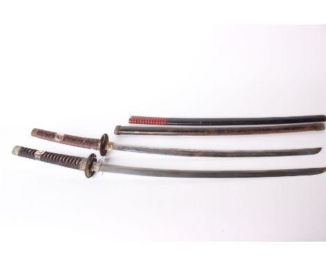 Two Oriental Samurai Swords, one with metal Scabbard And cloth wrapped Handle And Brass Fittings, the second with shagreen ef