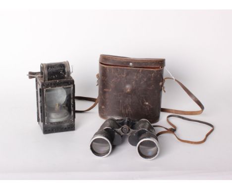 A German Helmholtz & Pauli Frankfurt railway lamp and a pair of Carl Zeiss Jena binoculars, with leather carrying case (2)