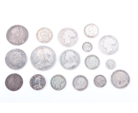 A coin collectors cabinet and a large collection of coins to include a wide selection of 16th to 20th century British and For