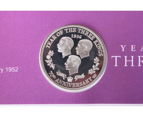 A 1936 year of the Three King silver coin in presentation case and further commemorative coins 