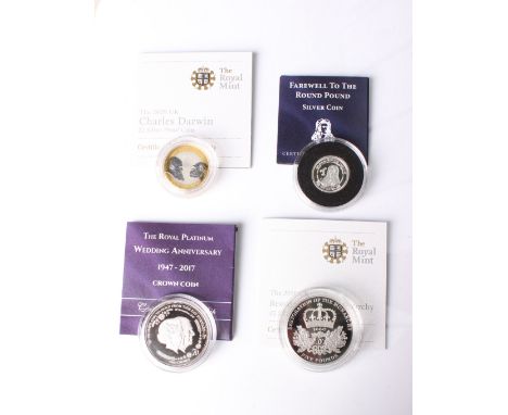 A Restoration of the Monarchy Silver proof £5 coin, a Royal Platinum Wedding Anniversary Crown coin, sterling silver round po