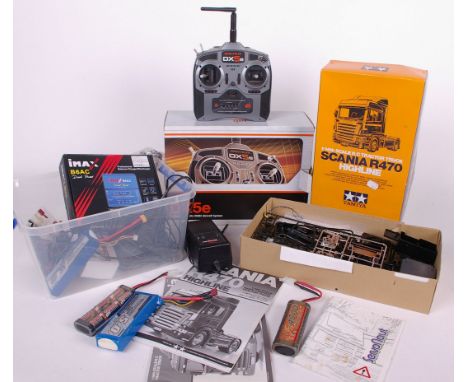 A boxed Tamiya Scania R620 model(unassembled) together with motorized support legs kit in box and a collection of modellers t
