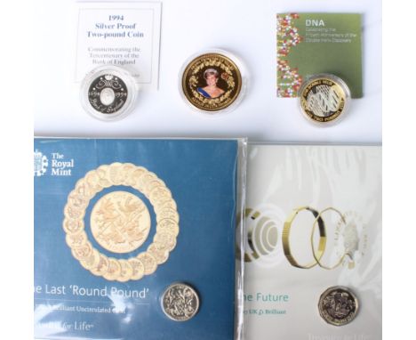 Two silver proof £2 coins (tercentenary of Bank of England and DNA), together with a gold plated Princess Diana commemorative