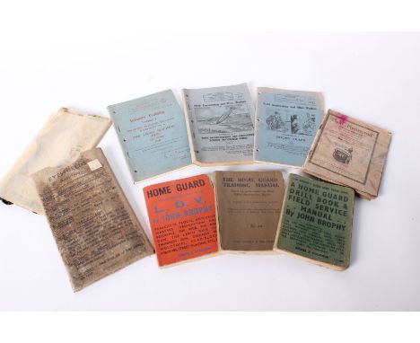 A selection of Home Guard booklets and Engineering Manuals together with related books, a German Phrase Book, Ration Books, E