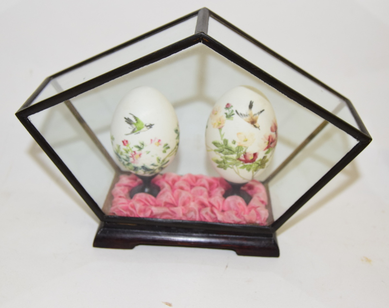 Three chinese hand painted egg display cases, each in a glazed box with
