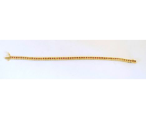 10ct gold ladies ruby tennis bracelet