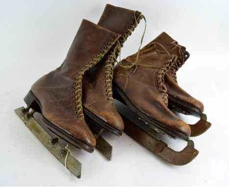 Two pairs of Vintage leather Ice Skates