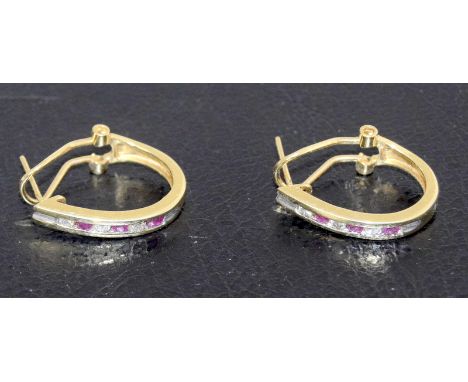 a pair of 14ct yellow gold ruby and diamond earrings