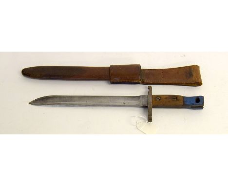 A WW1 Canadian Ross bayonet in its leather scabbard and frog. Makers name to the hilt Ross Rifle Co. Blade length 26cms