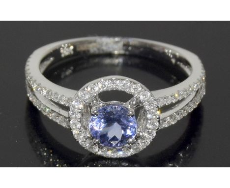 an 18ct white gold tanzanite and diamond ring of 1.2ct's. Size M