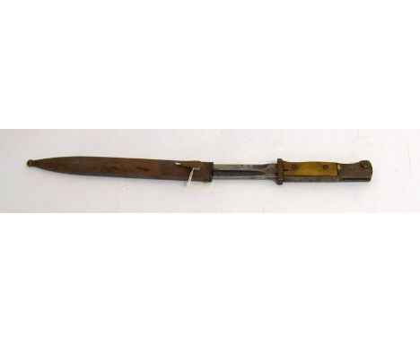 A WW2 Third Reich knife bayonet in its steel scabbard with matching serial numbers. Blade length 25cms