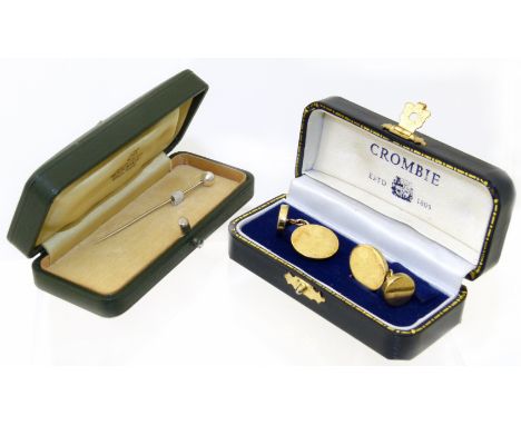 A pair of silver gilt Crombie cufflinks in maker's case, together with a Mikimoto cultured pearl stick pin in maker's case. C