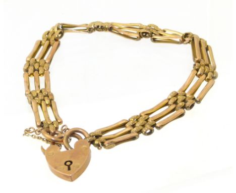 A bracelet, the gate link chain with heart shape padlock clasp, stamped 9ct, gross weight 10.7g. Condition reports are not av
