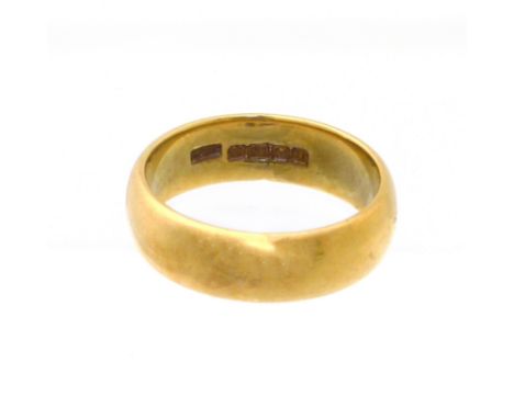 An 18ct gold band ring, hallmarks for Birmingham, ring size T, gross weight 10.4g. Condition reports are not available for ou