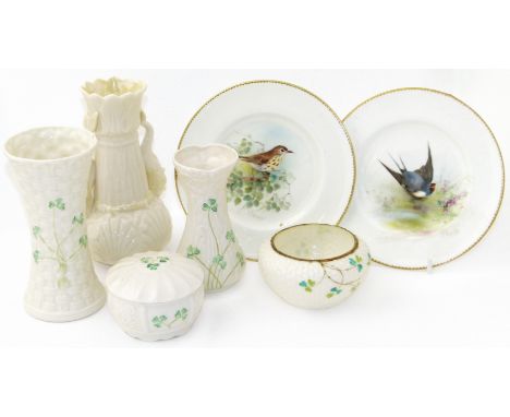 Pair of Royal Worcester plates painted with birds also three Belleek vases and two pots. Condition reports are not available 