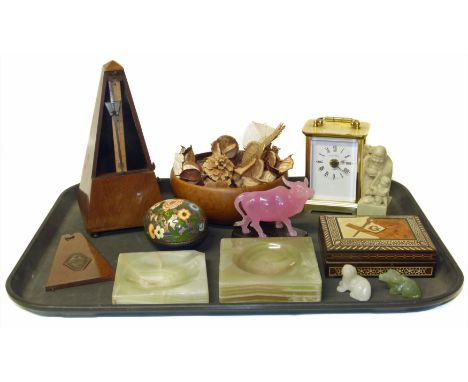 Metronome, onyx ashtrays, soapstone figures, carriage clock and small inlaid box. Condition reports are not available for our