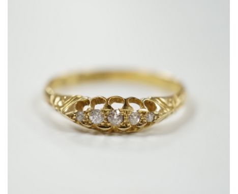 A Victorian 18ct gold and graduated five stone diamond chip set half hoop ring, size X, gross weight 3.6 grams.