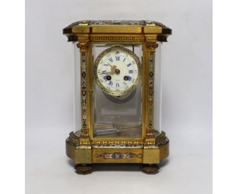 A late 19th century French gilt brass and champleve enamel cased eight day four glass mantel clock, 34cm high
