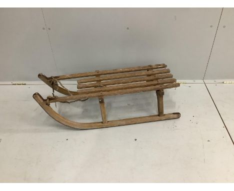 A vintage wooden sledge, length 89cm