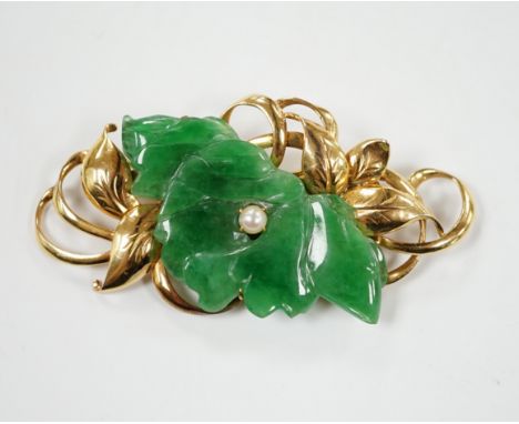 A 14k yellow metal, carved jade and seed pearl mounted floral spray brooch, 57mm, gross weight 12.7 grams.