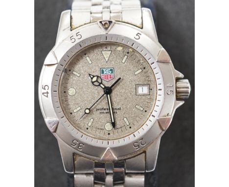 A gentleman's stainless steel Tag Heuer Professional quartz wrist watch, WD 1211-K-20, with box, instructions and guarantee.