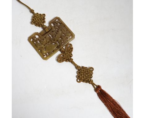 A Chinese carved jade ‘fish’ pendant, 6.5 x 9cm
