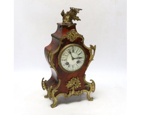 A late 19th century Louis XV style eight day red tortoiseshell and gilt metal cased mantel clock, 34cm high