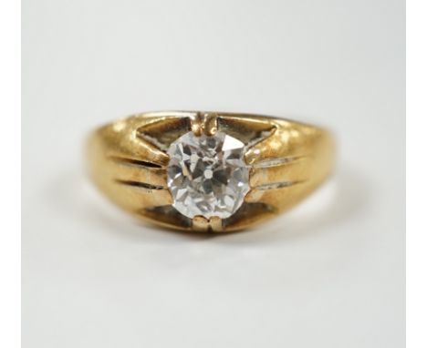 A late Victorian 18ct gold and claw set solitaire diamond ring, size P, gross weight 6.1 grams, the stone weighing approximat