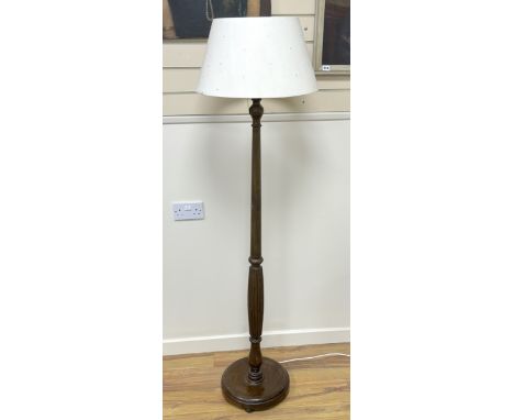 A mahogany standard lamp with shade, height including shade 170cm