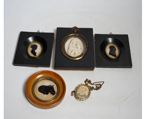 Three miniature reverse glass painted silhouettes, a relief plaque of the virgin and child and a watercolour portrait pendant