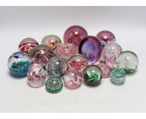 A group of glass paperweights including Caithness
