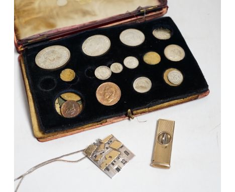 A 9 carat gold cigar cutter, silver pendant and a George VI specimen coin set a/f