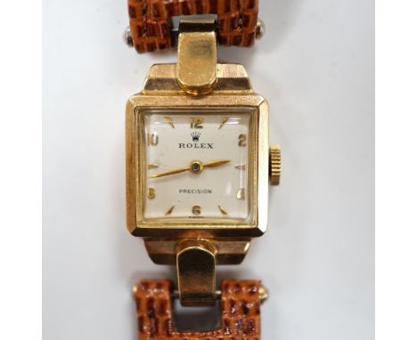 A lady's 1950's 9ct gold Rolex manual wind wrist watch, on later associated leather strap.