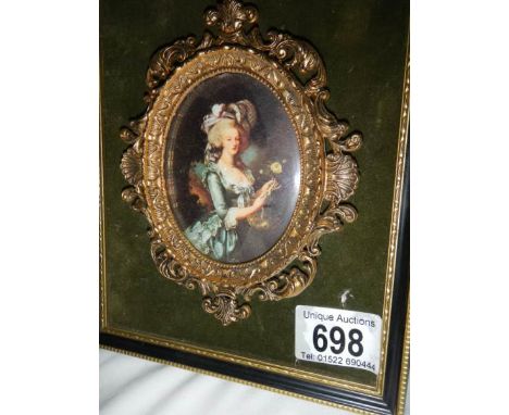 A good mid 20th century portrait of a lady in a metal frame.