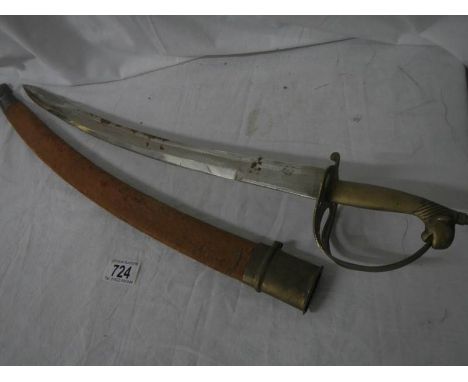 An Indian cutlass in scabbard.